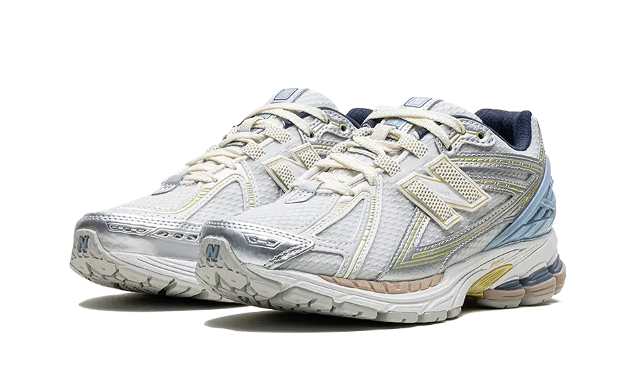 1906R Kith White Blue